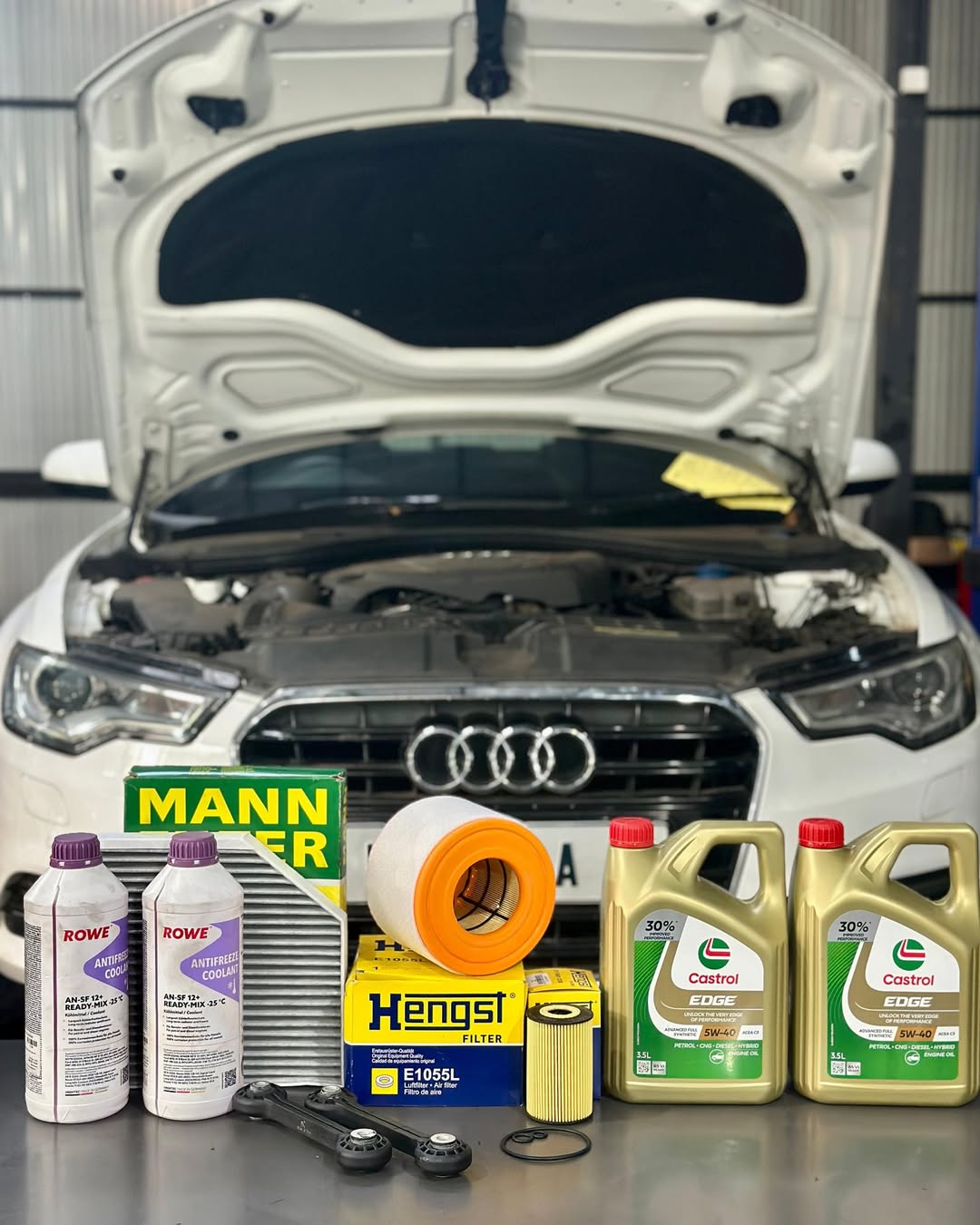 AUDI A6 TDI (150k km) in for periodic maintenance.Replacing- .Engine oil .Oil filter .Air filte